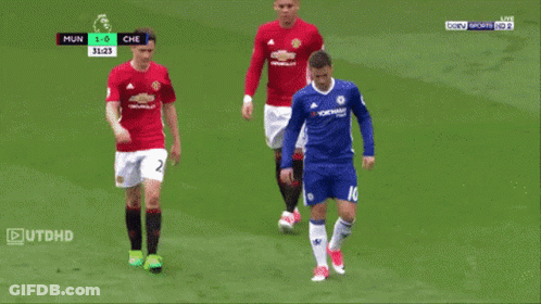 A Soccer Player Wearing A Number 10 Jersey Stands On The Field GIF
