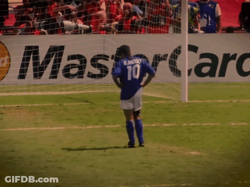 A Soccer Player Wearing A Number 10 Jersey Stands On The Field GIF