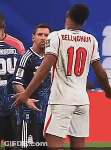 A Soccer Player Wearing A Number 10 Jersey Talks To Another Player GIF