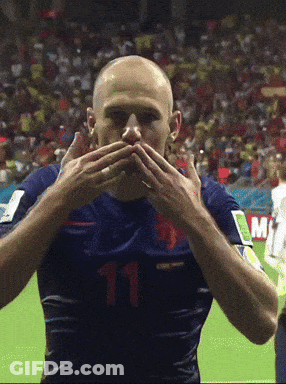 A Soccer Player Wearing A Number 11 Jersey Covers His Mouth With His Hands GIF