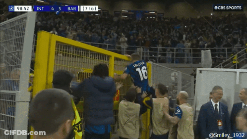 A Soccer Player Wearing A Number 16 Jersey Is Jumping Over A Fence GIF