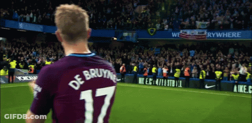 A Soccer Player Wearing A Number 17 Jersey Stands In Front Of A Crowd GIF