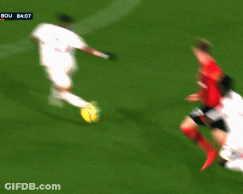 A Soccer Player Wearing A Number 2 Jersey Runs On The Field GIF