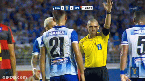 A Soccer Player Wearing A Number 21 Jersey Stands Next To Another Player GIF