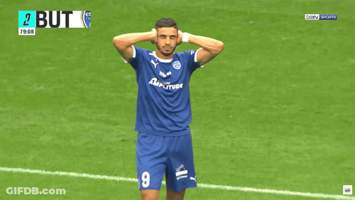 A Soccer Player Wearing A Number 25 Jersey Stands On The Field GIF