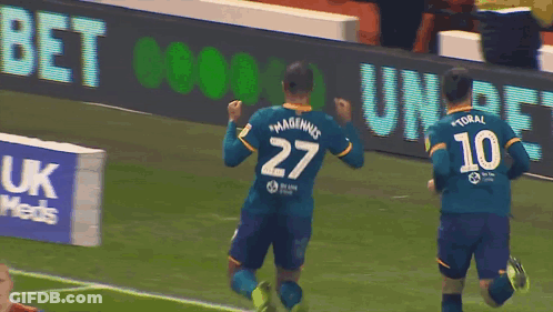 A Soccer Player Wearing A Number 27 Jersey Celebrates A Goal GIF