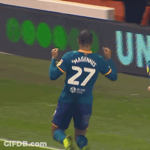 A Soccer Player Wearing A Number 27 Jersey Kneeling On The Field GIF