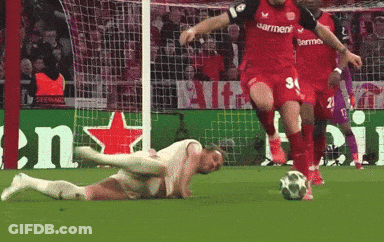 A Soccer Player Wearing A Number 34 Jersey Kicks The Ball GIF