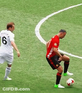A Soccer Player Wearing A Number 6 Jersey Kicks The Ball GIF