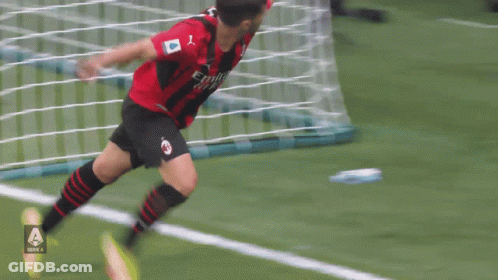 A Soccer Player Wearing A Number 8 Jersey Is Running On The Field GIF