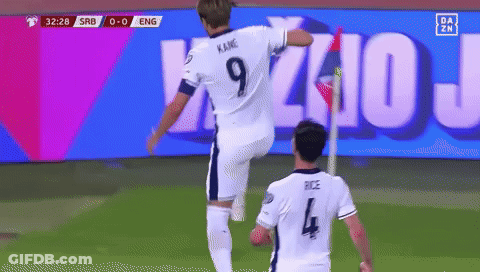 A Soccer Player Wearing A Number 9 Jersey Jumps In The Air GIF