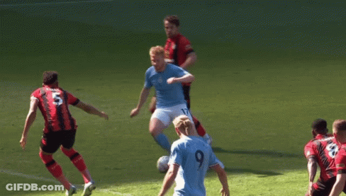 A Soccer Player Wearing A Number 9 Jersey Kicks The Ball GIF