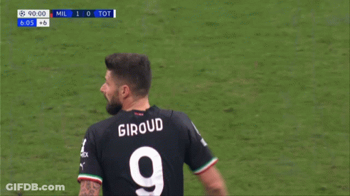 A Soccer Player Wearing A Number 9 Jersey Stands On A Field GIF