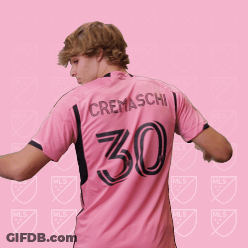 A Soccer Player Wearing A Pink Jersey With The Number 30 On It GIF