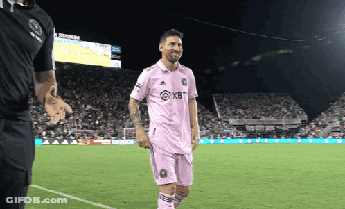 A Soccer Player Wearing A Pink Shirt With Xbt On It GIF
