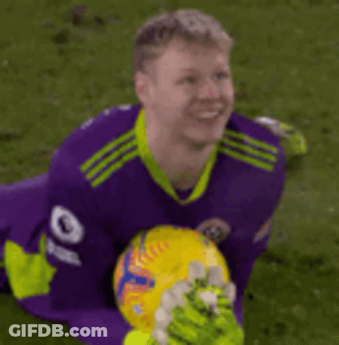 A Soccer Player Wearing A Purple Jersey With The Number 9 On The Sleeve GIF