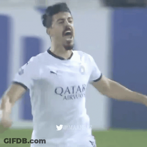 A Soccer Player Wearing A Qatar Airlines Jersey Is Celebrating GIF