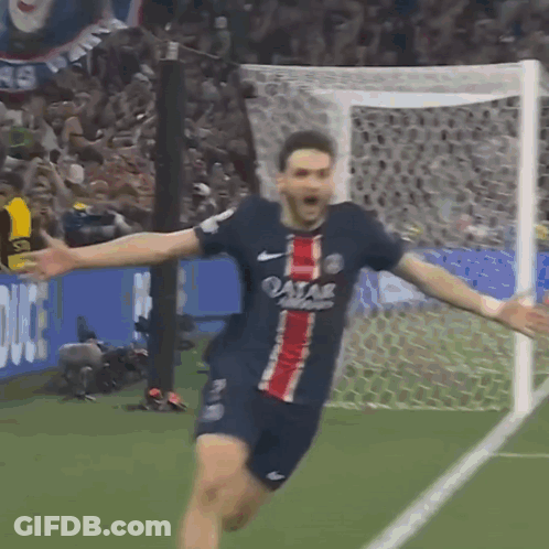 A Soccer Player Wearing A Qatar Airways Jersey Celebrates His Goal GIF