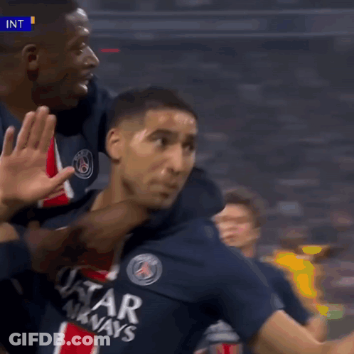 A Soccer Player Wearing A Qatar Airways Jersey Is Giving A High Five GIF