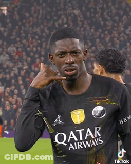 A Soccer Player Wearing A Qatar Airways Jersey Is Making A Call Me Gesture GIF
