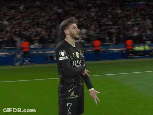 A Soccer Player Wearing A Qatar Airways Jersey Is Running On The Field GIF
