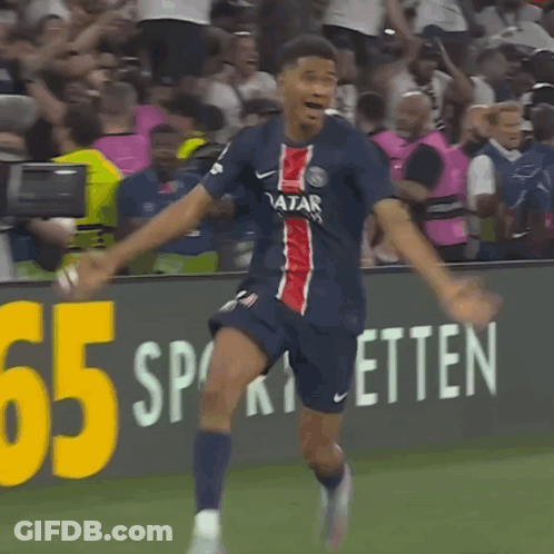 A Soccer Player Wearing A Qatar Jersey Celebrates GIF
