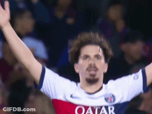 A Soccer Player Wearing A Qatar Shirt Celebrates GIF