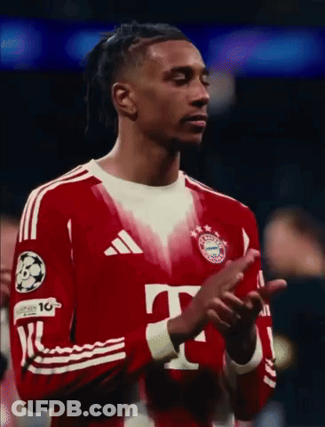 A Soccer Player Wearing A Red Adidas Jersey Is Clapping GIF