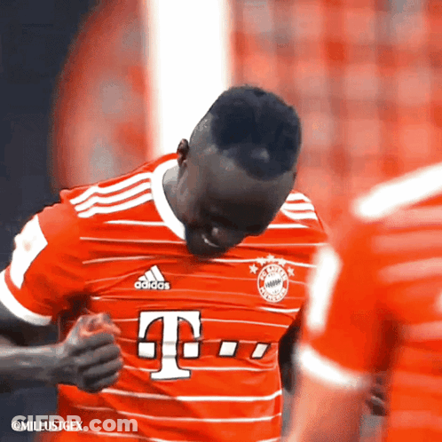 A Soccer Player Wearing A Red Adidas Jersey GIF
