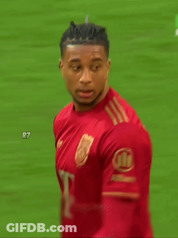 A Soccer Player Wearing A Red Adidas Jersey With A T On The Front GIF