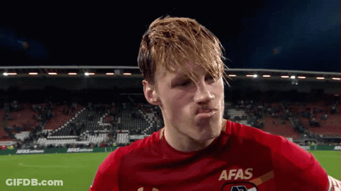 A Soccer Player Wearing A Red Afas Jersey GIF
