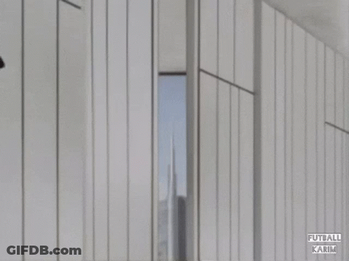 A Soccer Player Wearing A Red And Black Emirates Fly Bets Jersey GIF
