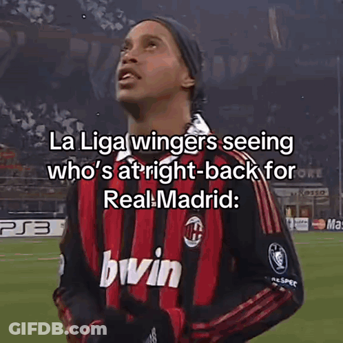 A Soccer Player Wearing A Red And Black Jersey With The Word Bwin On It GIF