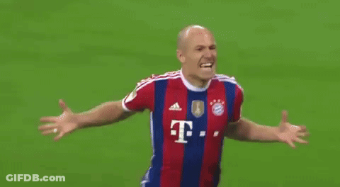 A Soccer Player Wearing A Red And Blue Striped Jersey With The Letter T On It GIF