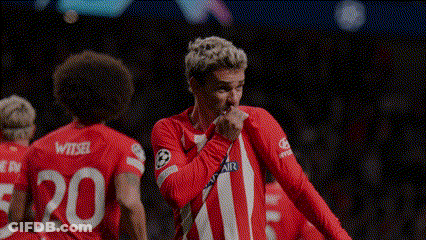 A Soccer Player Wearing A Red And White Jersey With The Number 20 On The Back GIF