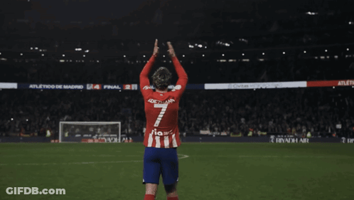 A Soccer Player Wearing A Red And White Jersey With The Number 7 On It GIF