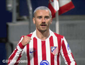 A Soccer Player Wearing A Red And White Striped Jersey With The Letters Atm On The Front GIF