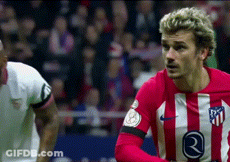 A Soccer Player Wearing A Red And White Striped Jersey With The Number 21 On It . GIF