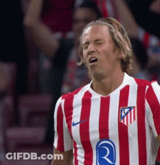 A Soccer Player Wearing A Red And White Striped Shirt With The Letter R On It GIF