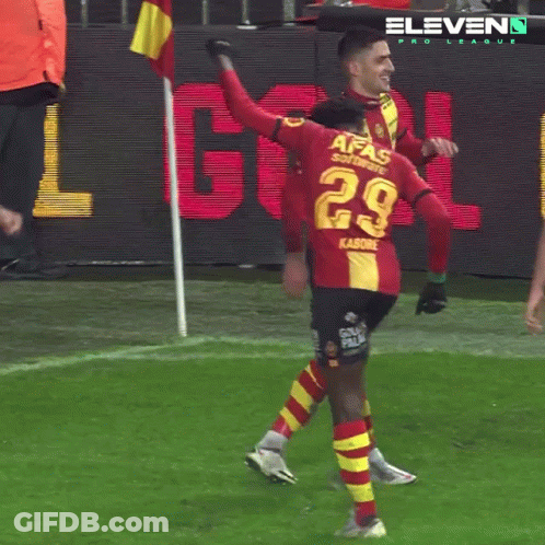 A Soccer Player Wearing A Red And Yellow Jersey With The Number 29 On It GIF