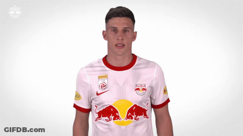 A Soccer Player Wearing A Red Bull Jersey Giving A Thumbs Up GIF