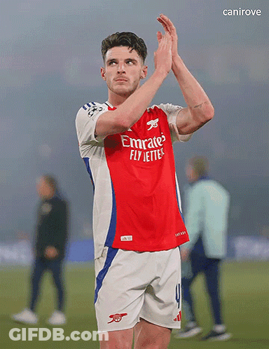 A Soccer Player Wearing A Red Emirates Fly Jetters Jersey GIF