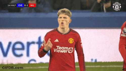 A Soccer Player Wearing A Red Jersey That Says Team Viewer GIF