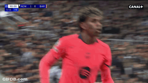 A Soccer Player Wearing A Red Jersey With A Spotify Logo On His Chest GIF