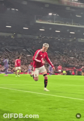 A Soccer Player Wearing A Red Jersey With A United Logo On It GIF