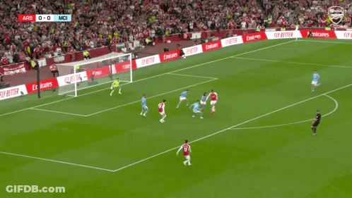 A Soccer Player Wearing A Red Jersey With Emirates On It GIF