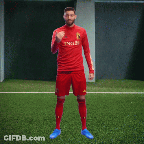 A Soccer Player Wearing A Red Jersey With Ing On The Front GIF