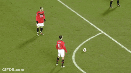 A Soccer Player Wearing A Red Jersey With The Number 11 On It GIF