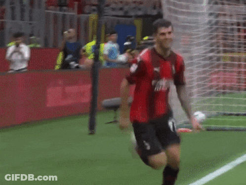 A Soccer Player Wearing A Red Jersey With The Number 11 On It GIF