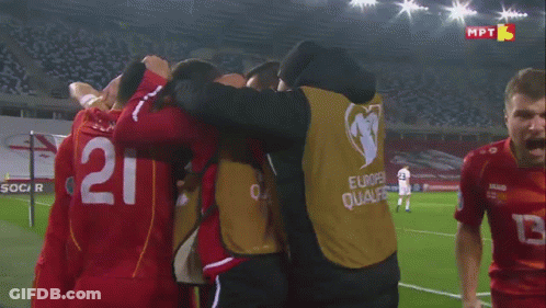 A Soccer Player Wearing A Red Jersey With The Number 13 On It GIF